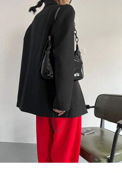 Zweiteiliges Damen-Set mit Stickerei: Langarm-Oberteil mit Reverskragen und hoch taillierte, lange Hose – stilvoll und elegant.