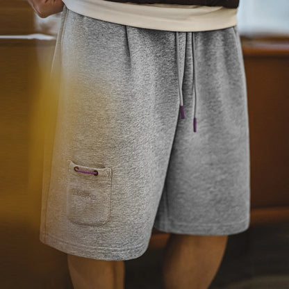 Herren Jogger-Shorts aus atmungsaktivem Material mit elastischer Taille und lockerer Passform