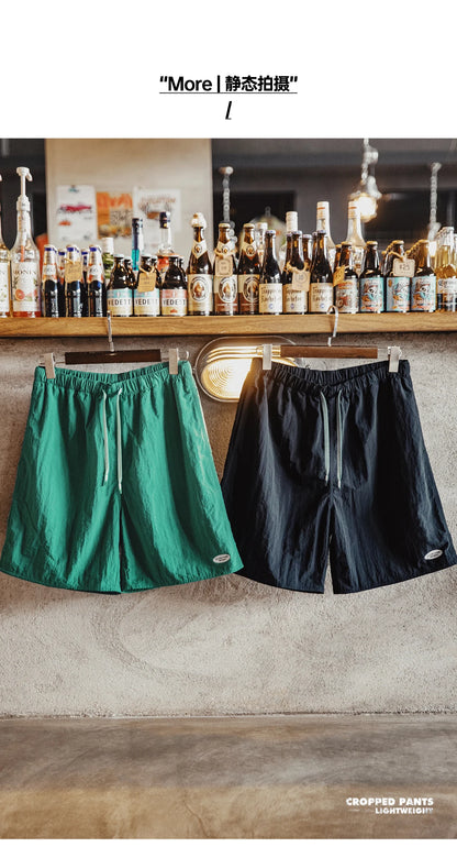 Herren Shorts im sportlichen Funktionsstil mit elastischer Taille und Taschen