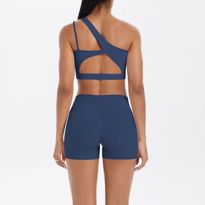 Frauen-Yoga-Set: dunkelblaues Top mit gekreuzten Trägern am Rücken und Shorts