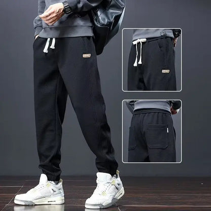 Herrenhosen Herbst und Winter Japanische Krawatten Lose Sport Kordelzug Warme Freizeithosen