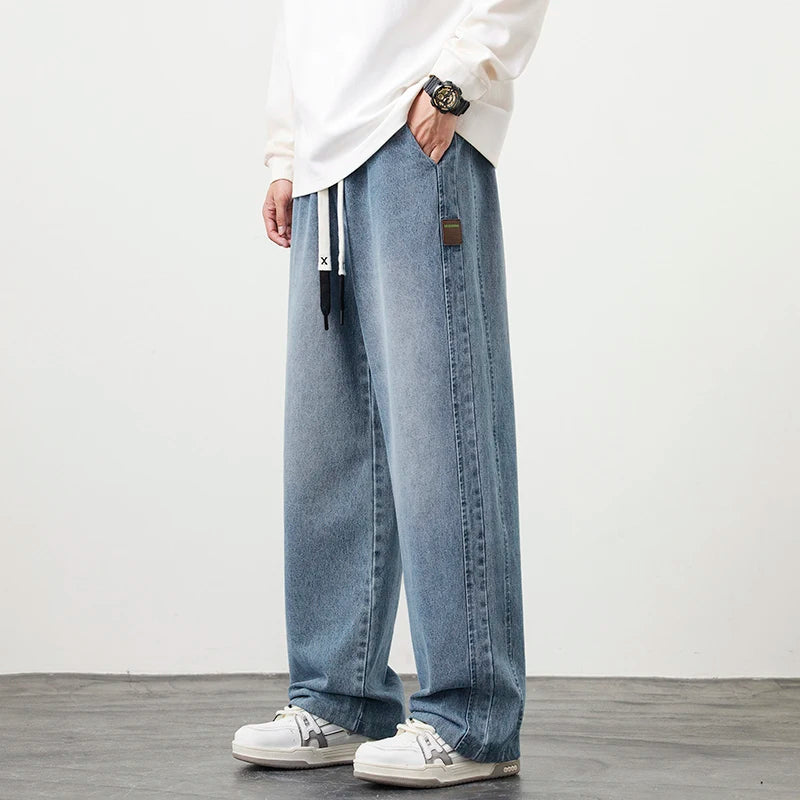Männer Jeans mit elastischer Taille in schwarz-blauer Farbgebung im Hip Hop Stil