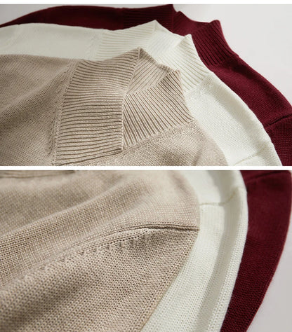Strickpullover-Ansicht: Beige-, Weiß- und Burgunderfarben übereinander