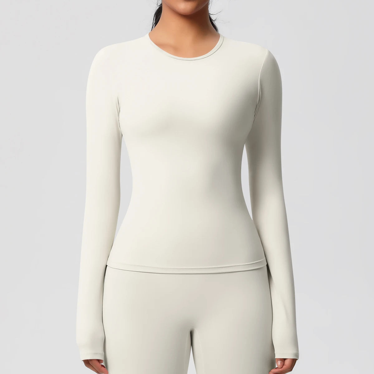 Damen-Workout-Longsleeve in Hellivory, körpernah mit Rundhalsausschnitt und langen Ärmeln