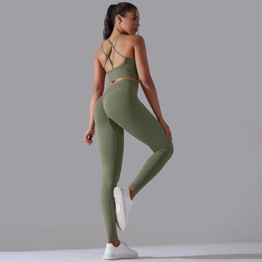 Dunkelgrünes nahtloses Yoga-Set: Tanktop mit gekreuztem Rückenteil, Leggings