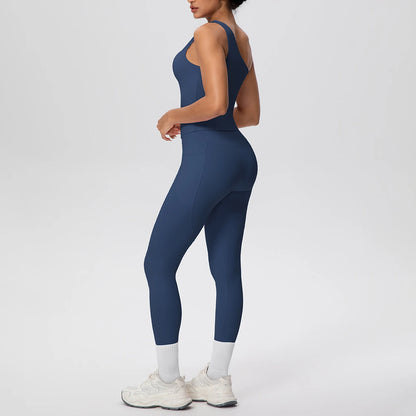 Yoga-Set aus ärmellosem Top und Leggings, dunkelblau; Rückansicht mit hellem Beinabschluss