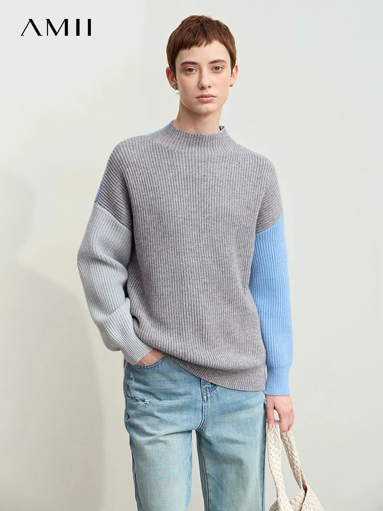 Rollkragenpullover, meliert grau mit hellblauen Ärmeln, gerippte Bündchen