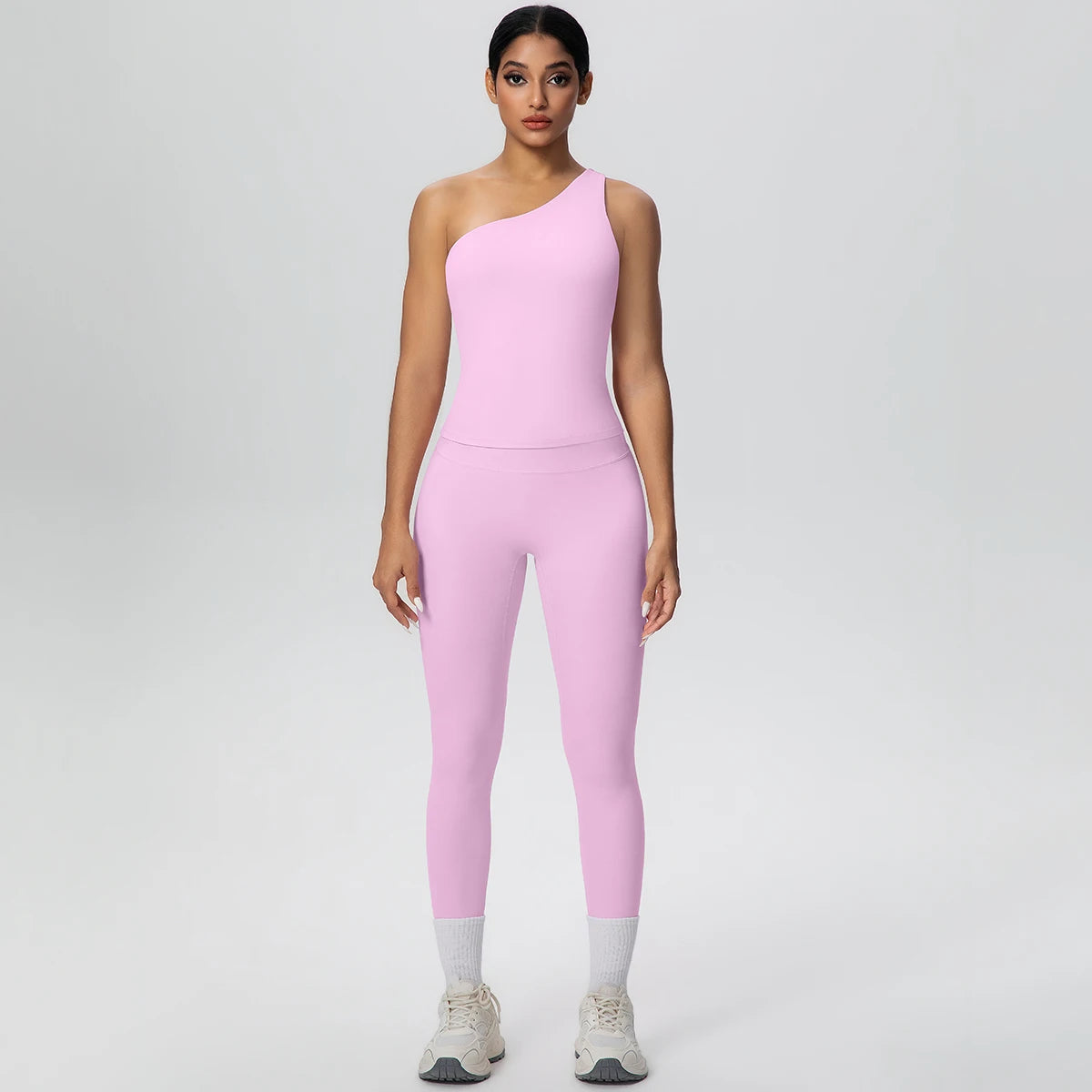 Rosa Yoga-Sportset aus Crop-Top und Leggings mit hohem Bund und hellen Beinabschlüssen