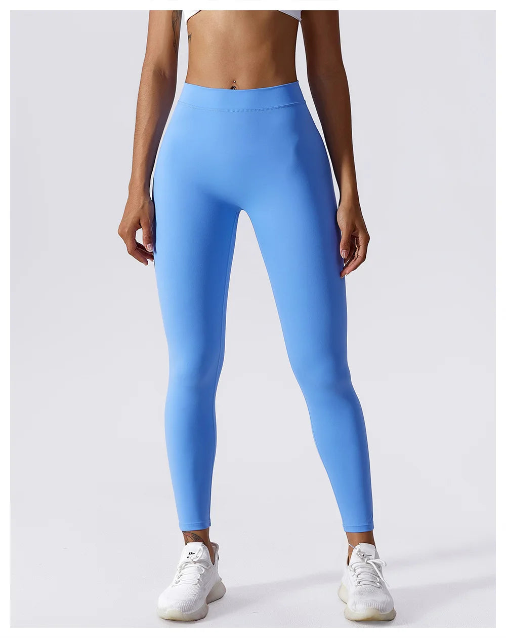 Yogaleggings mit hoher Taille, hellblau, Frontansicht mit schmalem Bein bis zum Knöchel