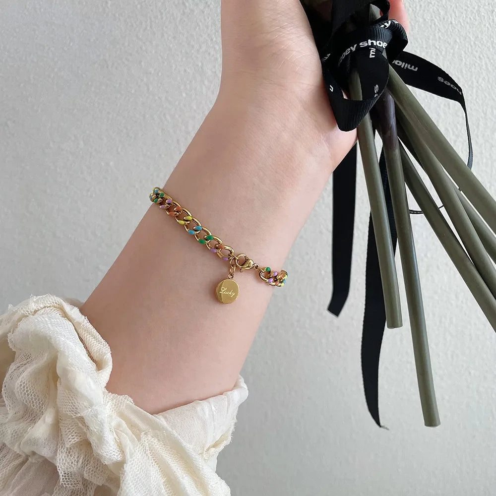 Damen-Armband mit Öltropfen-Glücksscheibe