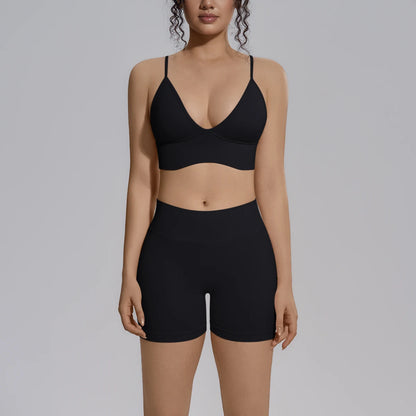 Schwarzes Yoga-Set mit Bustier und High-Waist-Shorts