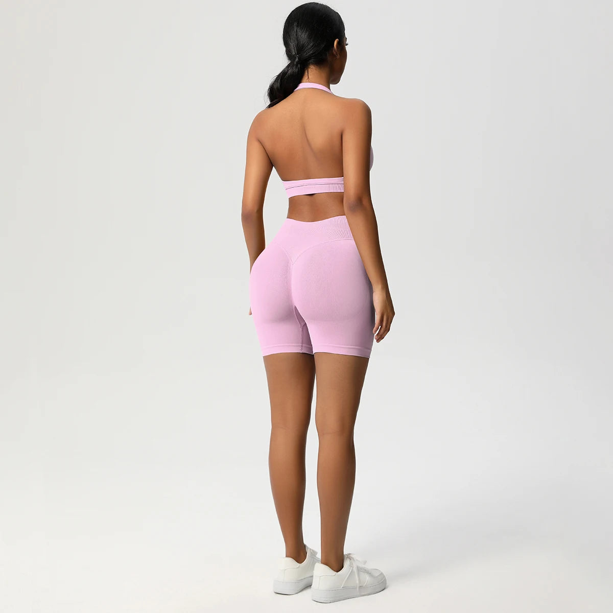 Nahtloses Fitness-Set für Damen: rosa Sport-BH & Laufshorts, Rückansicht