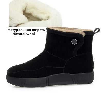 Damen-Winterstiefelette in Schwarz mit Wollfutter und breitem Profil