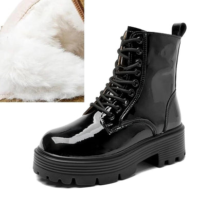 Knöchelhohe Schnürstiefel aus Leder, schwarz, mit plüschigem Innenfutter und Profilsohle