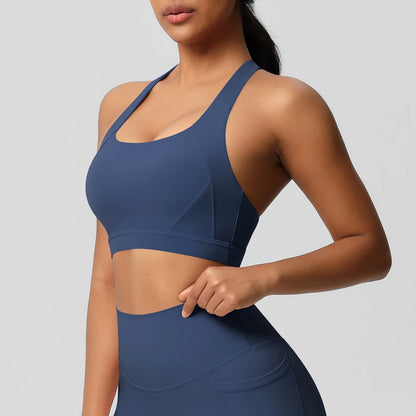 Sport-Crop-Top nackenfrei, dunkelblau, Front mit geschwungenem Ausschnitt