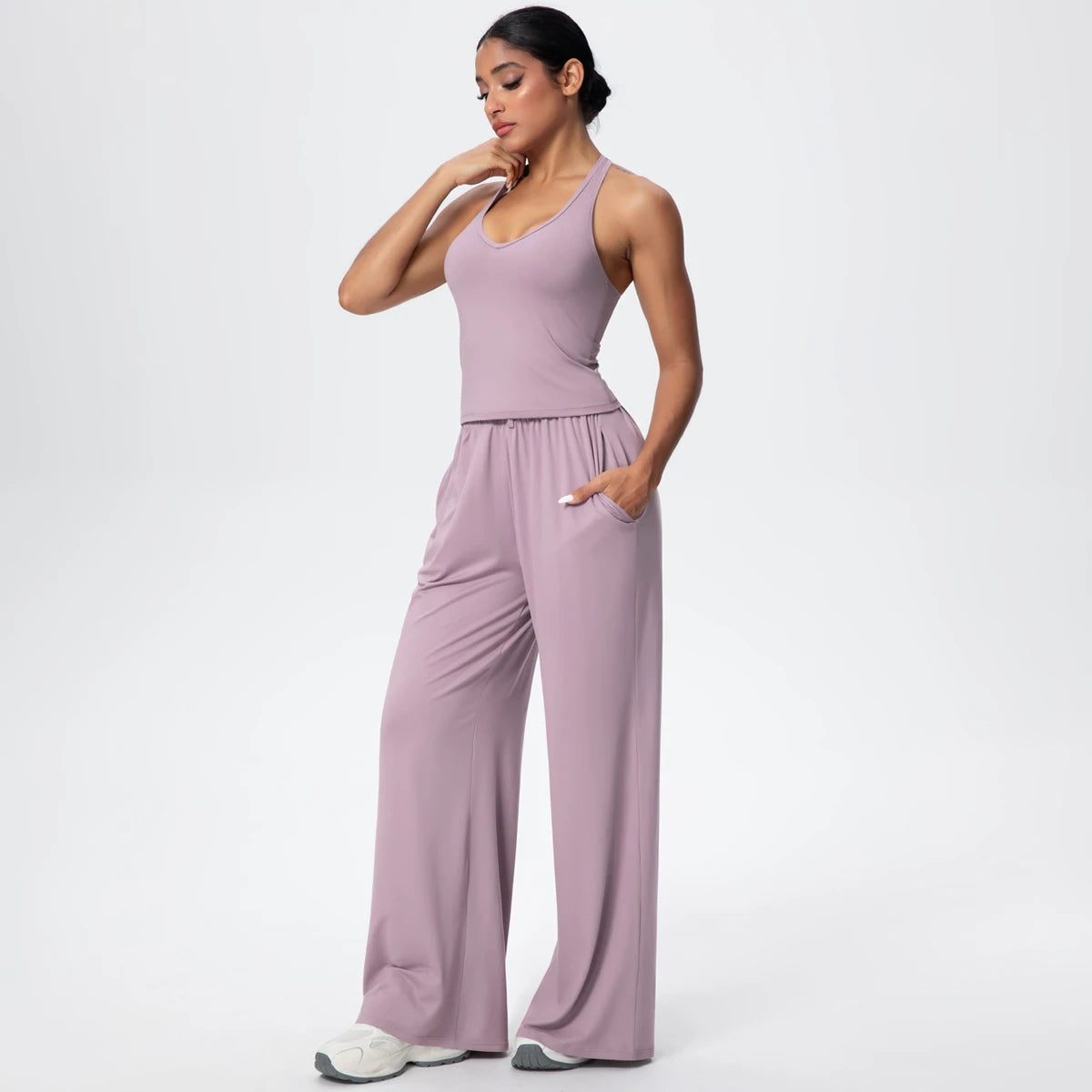 Lila Yoga-Set für Damen: ärmelloses Top und lange, weite Hose mit Raffung am Bund