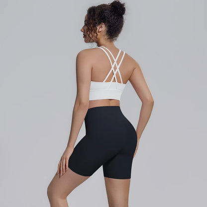 Damen-Yoga-Set: Sport-BH mit Rückenkreuz und Biker-Shorts, schwarz mit weißem BH