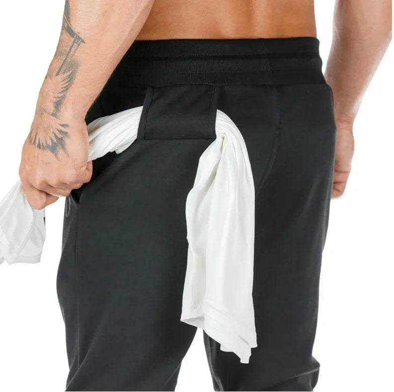 LOGO-freie Muscle Herren Sporthose Herren Fitness Hängende Handtuchhose Lauftraining Fußhose