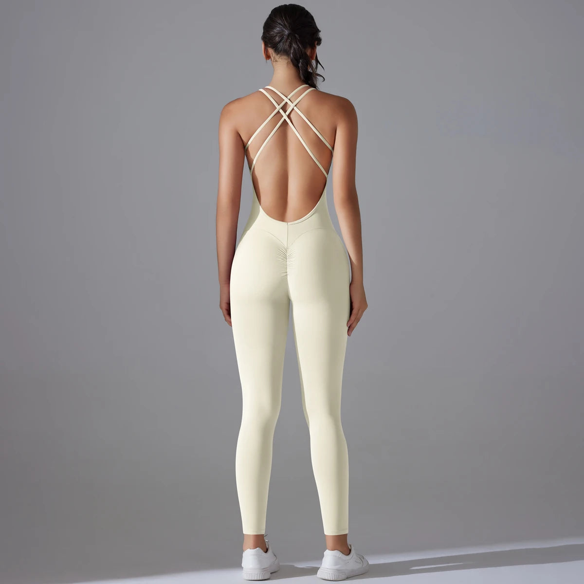 Damen-Yoga-Bodysuit Rückansicht mit X-Trägern, ärmellos, langes Bein, helles Ivory