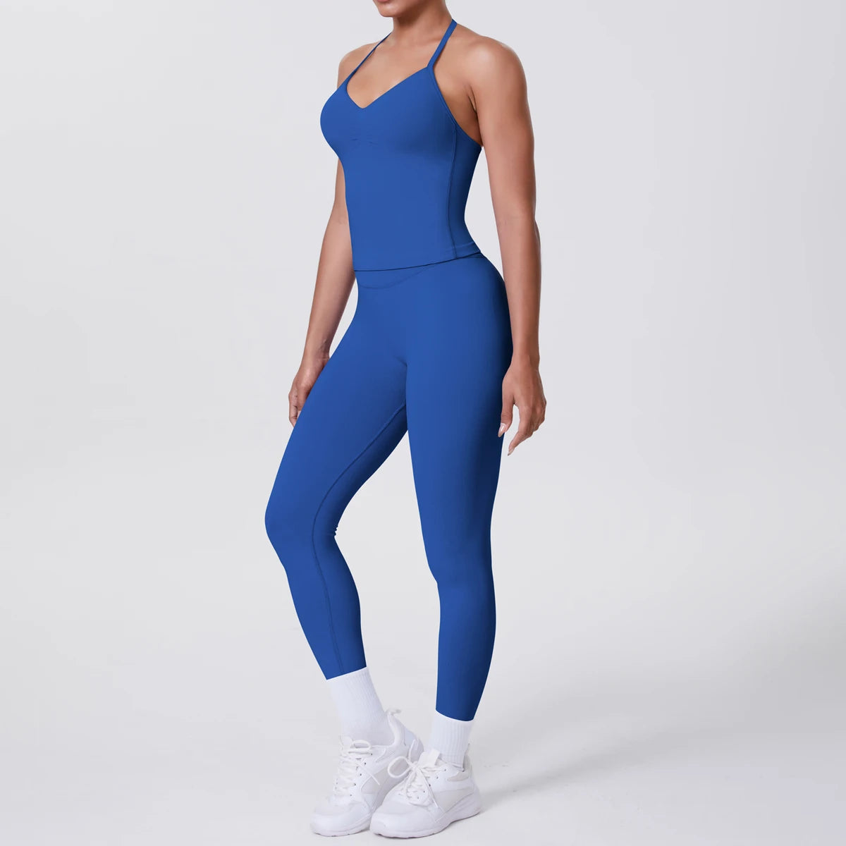 Damen Yoga-Set mit ärmelloser Weste und Leggings, mittelblau