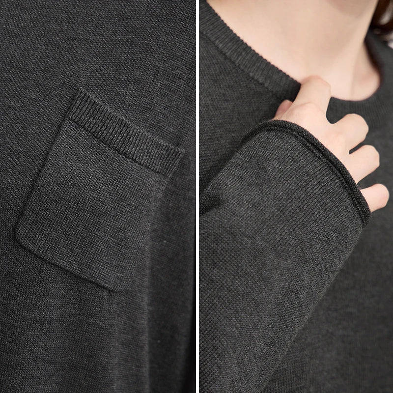 Dunkelgrauer Strickpullover: gerippter Halsausschnitt und Bündchen mit feiner Webstruktur