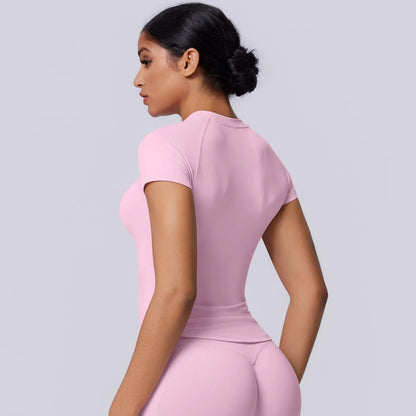 Nahtloses Funktionsshirt für Damen in hellem Pink, seitliche Rückansicht, Kurzarm