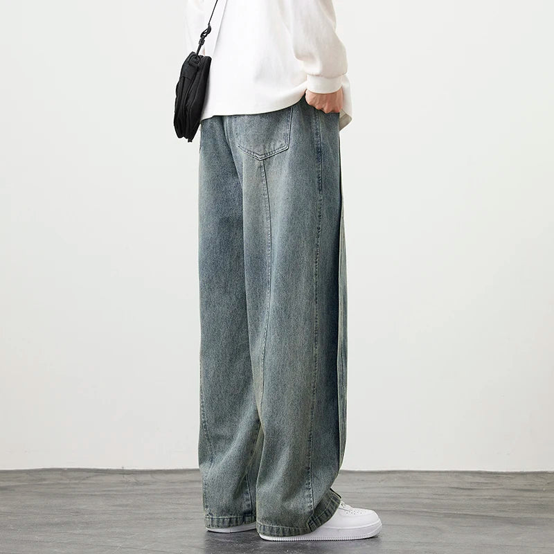 Herren Jeanshose mit brauner Stickerei im Hip Hop Stil