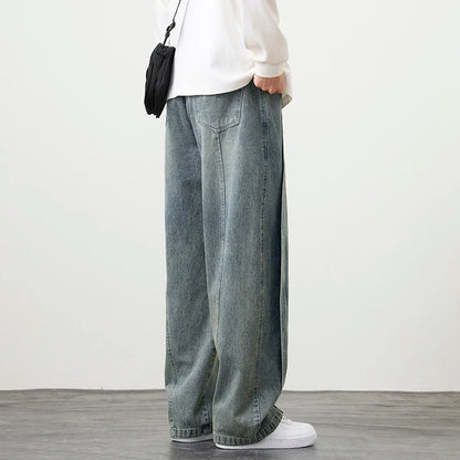 Herren Jeanshose mit brauner Stickerei im Hip Hop Stil
