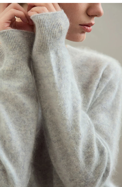 Warmer Damenpullover aus hellem Strick mit Rundhalsausschnitt und gerippten Bündchen