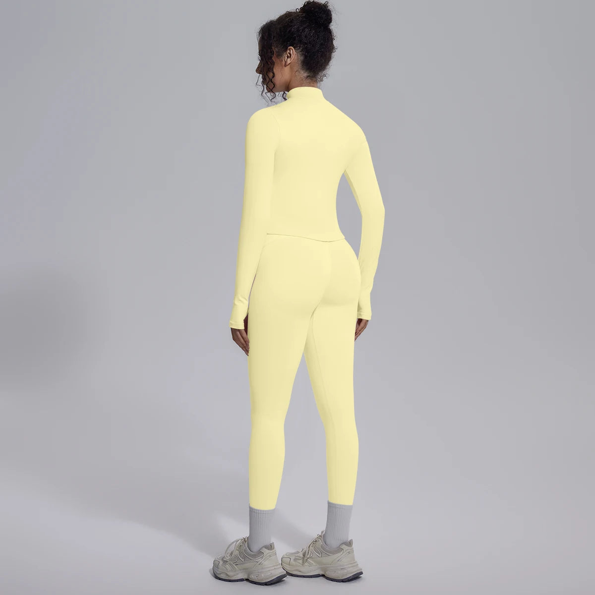 Nahtloses Yoga-Set Hellgelb, Rückansicht: langärmlige Jacke und High-Waist Leggings