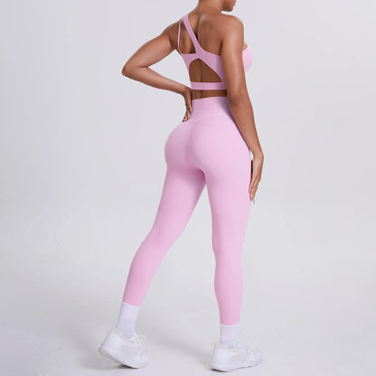 Yoga-Set Damen: rosafarbenes Sport-BH mit Trägerkreuz-Rücken und Leggings