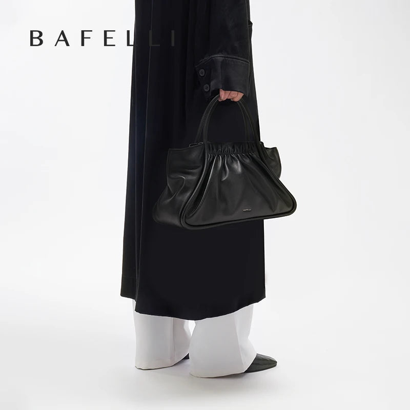 Schwarze Damenhandtasche aus Leder mit gerafftem Oberteil und kurzem Tragegriff
