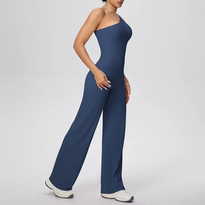 Dunkelblaues Yoga-Set: ärmelloses Top, lange Hose, seitliche Ganzkörperansicht