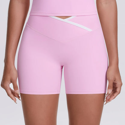 Damen-Yoga-Shorts, hochtailliert, hellrosa, Rückenansicht mit weißem Zierband im Schrittbereich