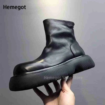 Schwarze Chelsea-Boots mit dickem Profil und rückseitigem Reißverschluss