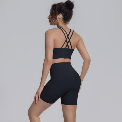 Damen-Yoga-Set: Sport-BH mit Rückenkreuz und Biker-Shorts, schwarz