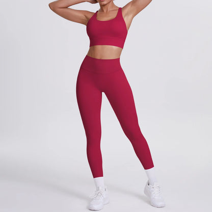 Fitness-Set Rot: gepolsterter Sport-BH, High-Waist-Leggings mit hellen Kontrastborten