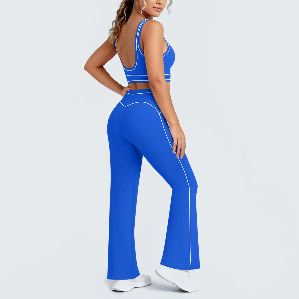 Damen Yoga-Set in Blau: Sport-BH mit Brustpolstern und weite Hose, seitliche Ansicht