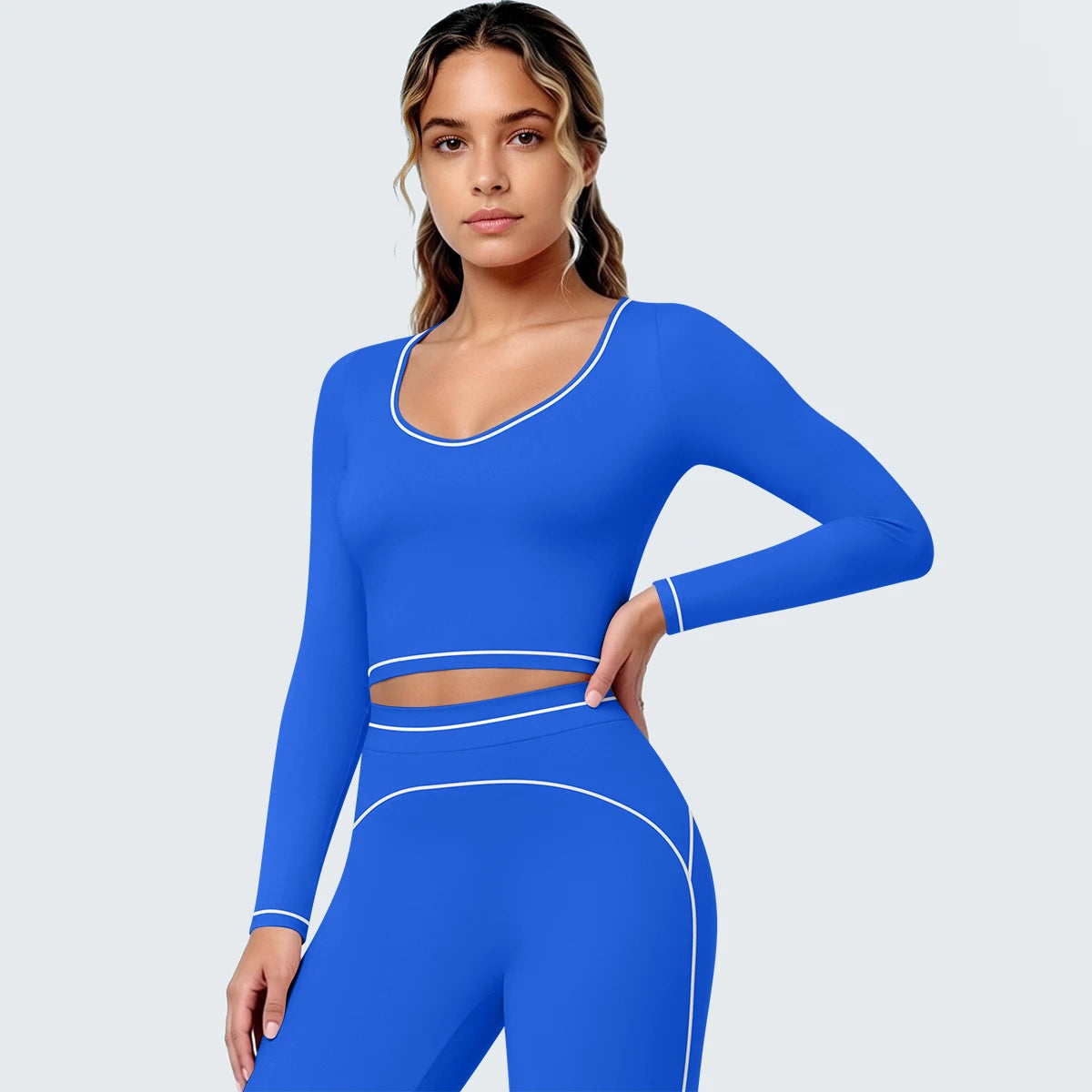 Blaues Yoga-Langarmshirt mit V-Ausschnitt und Kontrastpaspel, figurbetonter Look