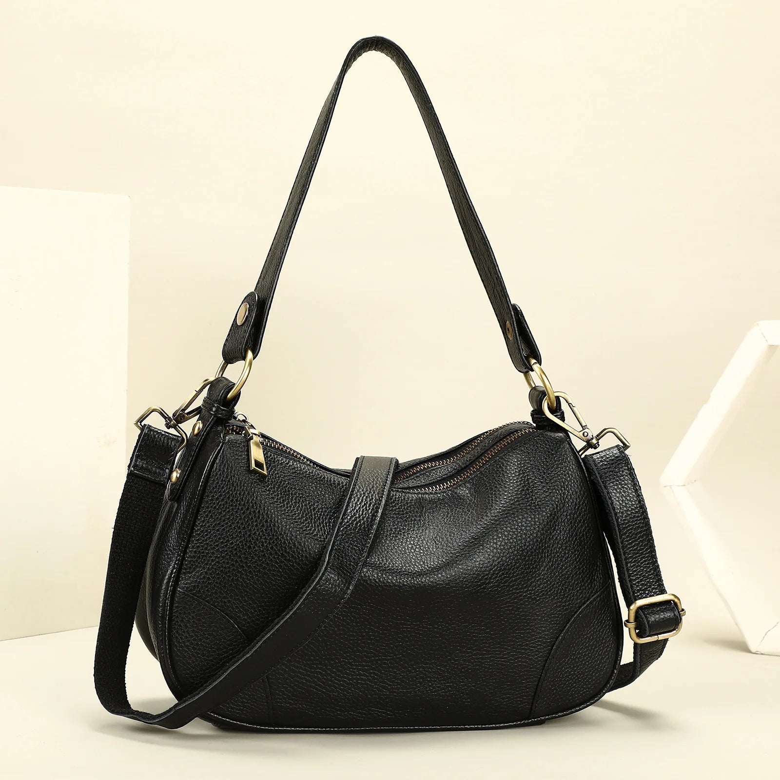 Damen-Schultertasche aus Leder, schwarz, halbmondförmig, zwei kurze Henkel und Schulterriemen