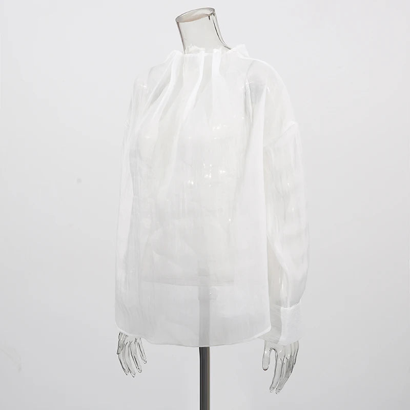 Lässige Damenbluse mit Spitzenbesatz und Patchwork-Design, langärmlig und mit Reverskragen – ideal für einen stilvollen Auftritt.
