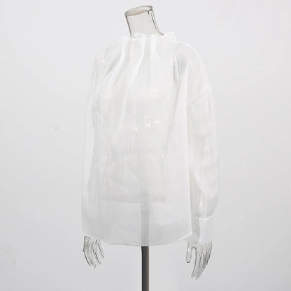 Lässige Damenbluse mit Spitzenbesatz und Patchwork-Design, langärmlig und mit Reverskragen – ideal für einen stilvollen Auftritt.
