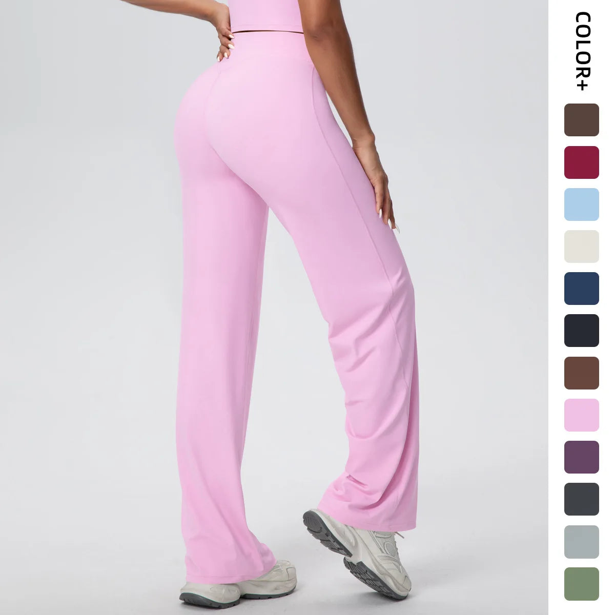 Weite Yoga-Hose in hellem Rosa mit hoher Taille, glatt fallend und bequem geschnitten.