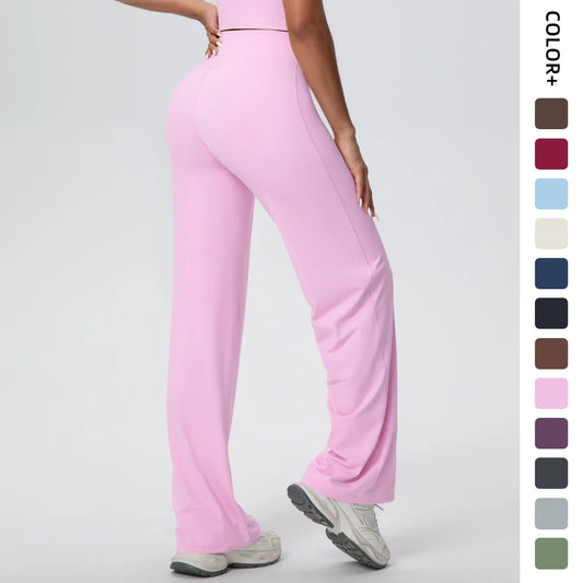 Weite Yoga-Hose in hellem Rosa mit hoher Taille, glatt fallend und bequem geschnitten.