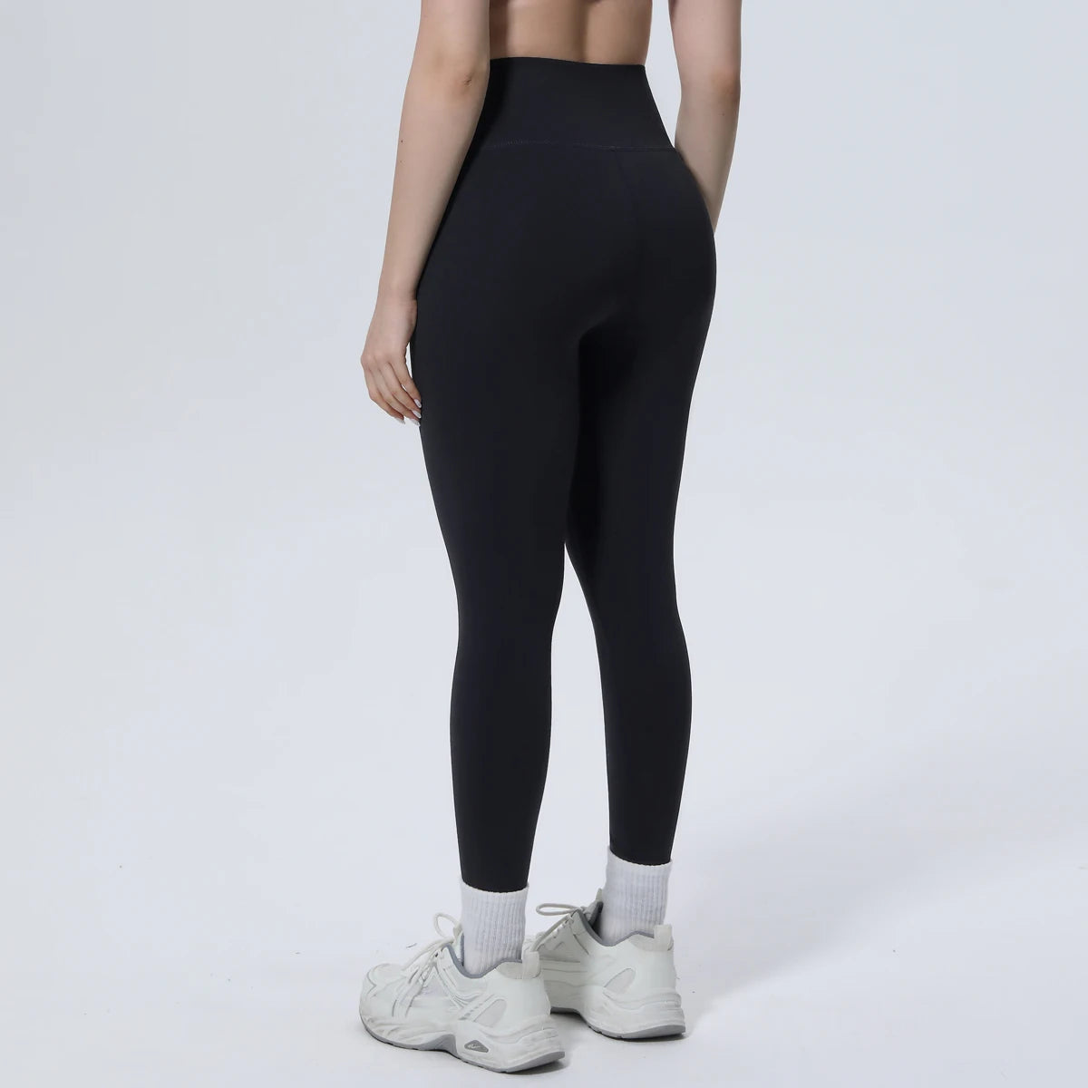 Nahtlose schwarze Yoga-Leggings für Damen mit überkreuztem Bund