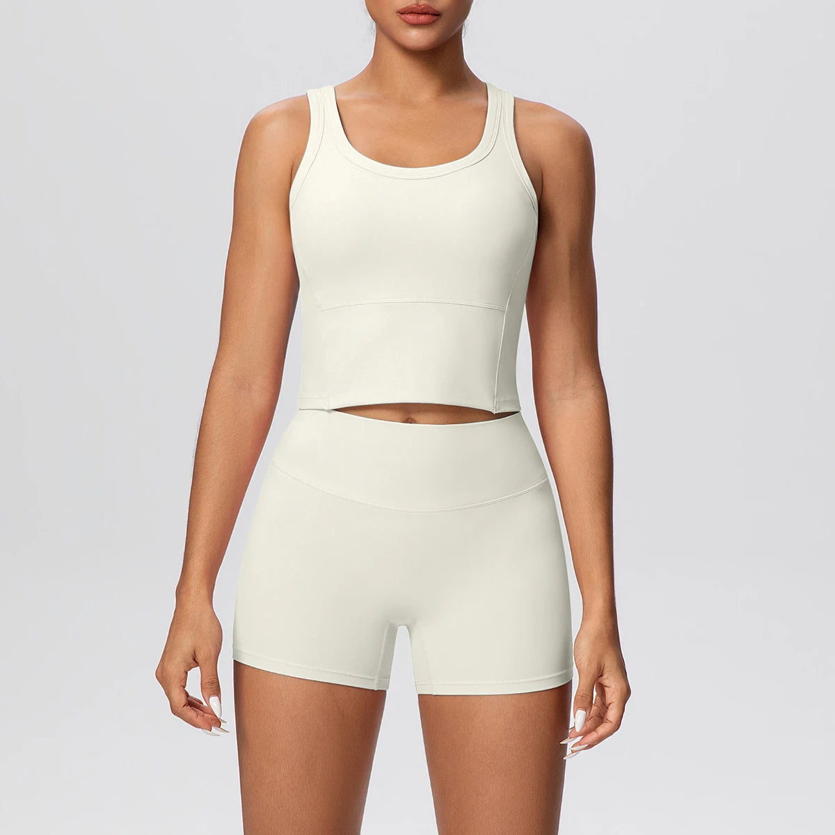 Damen-Yoga-Set in Hellbeige mit ärmellosem Top und kurzen Leggings, Cut-out