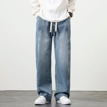 Herren Jeanshose mit brauner Stickerei im Hip Hop Stil