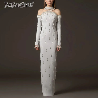Elegantes ärmelloses Minikleid mit Rundhalsausschnitt und Patchwork-Schal für Damen – figurbetont und stilvoll.