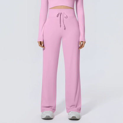 Rosa Yoga-Sommerhose mit Kordelzug am Bund und weitem Bein