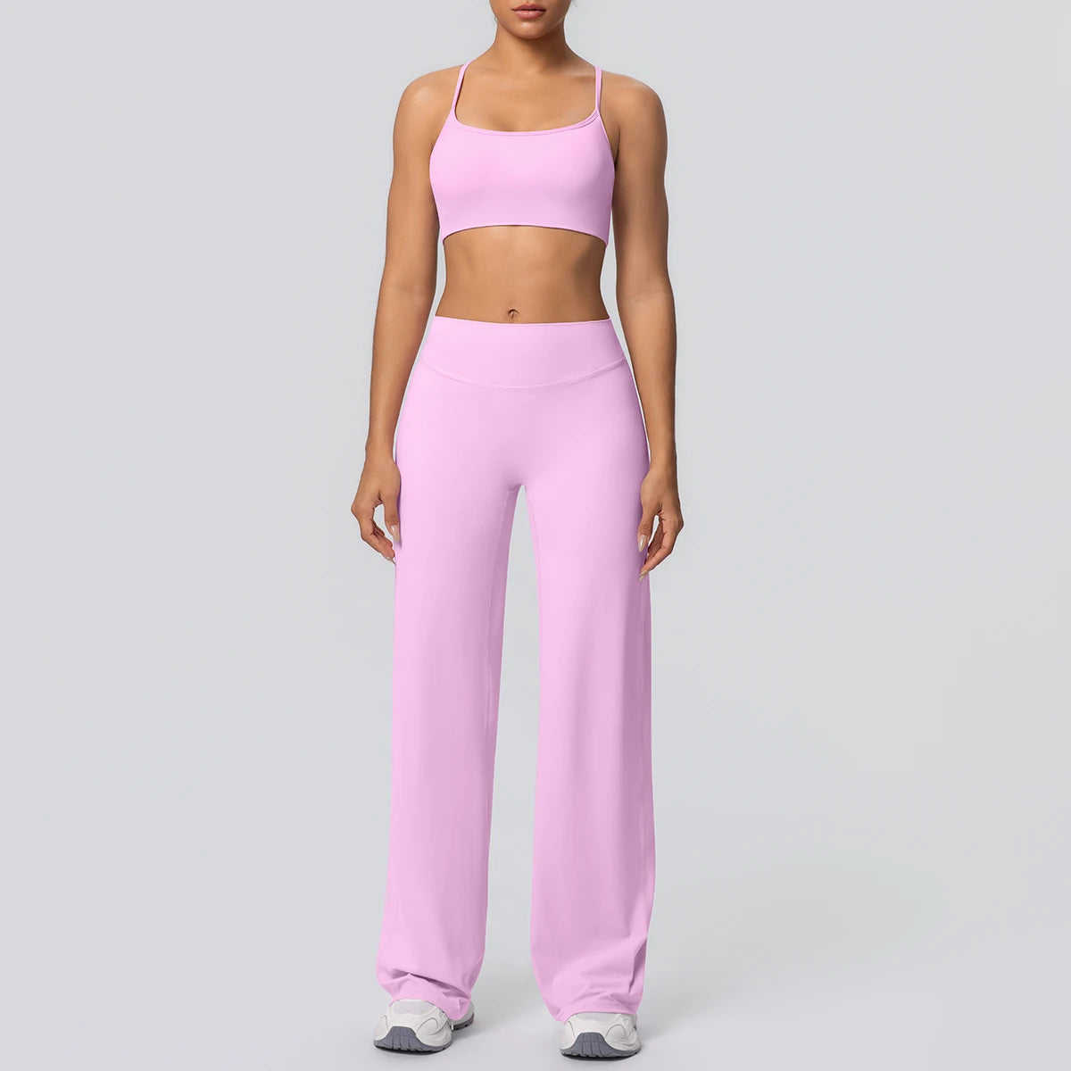 Yoga-Set mit Sport-BH und weiter Hose, rosa
